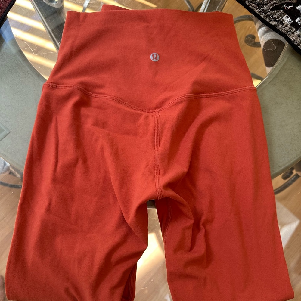 Lululemon leggings size 4, worn once. No signs of wear.